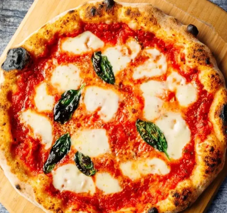 A traditional pizza margherita with fresh mozzarella, tomato sauce, and basil