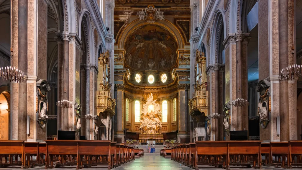 Interior of Naples Cathedral, with its grand baroque altar and impressive frescoes