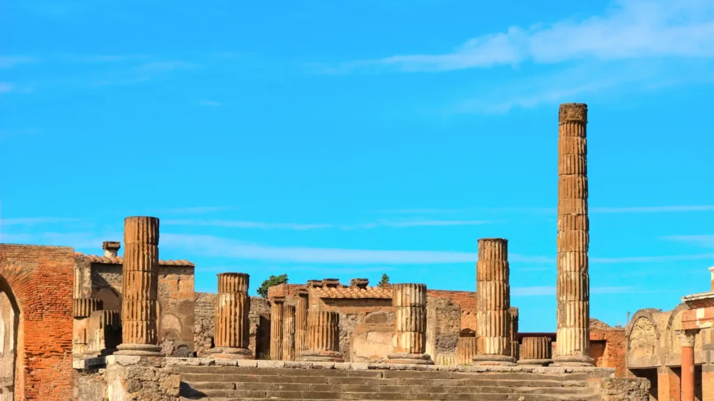 The Forum of Pompeii, showcasing ancient Roman columns and ruins